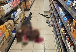 Вооружённый мужчина устроил стрельбу в Киеве и захватил заложников: есть погибшие